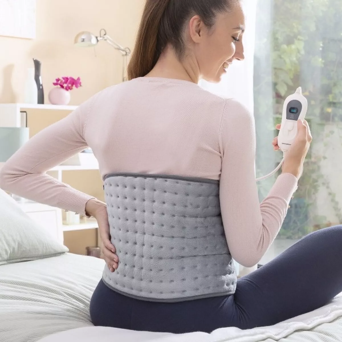 #1 - Elektrisk varmetæppe til nedre ryg og lænd - løsner stivhed og smerter